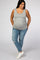 smiling pregnant woman wearing grey maternity tank top and distressed blue jeans