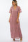 woman wearing a mauve floral lace maxi dress with short flutter sleeves and a v-neckline