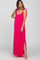 woman wearing a hot pink maternity maxi dress with tie straps and a side slit