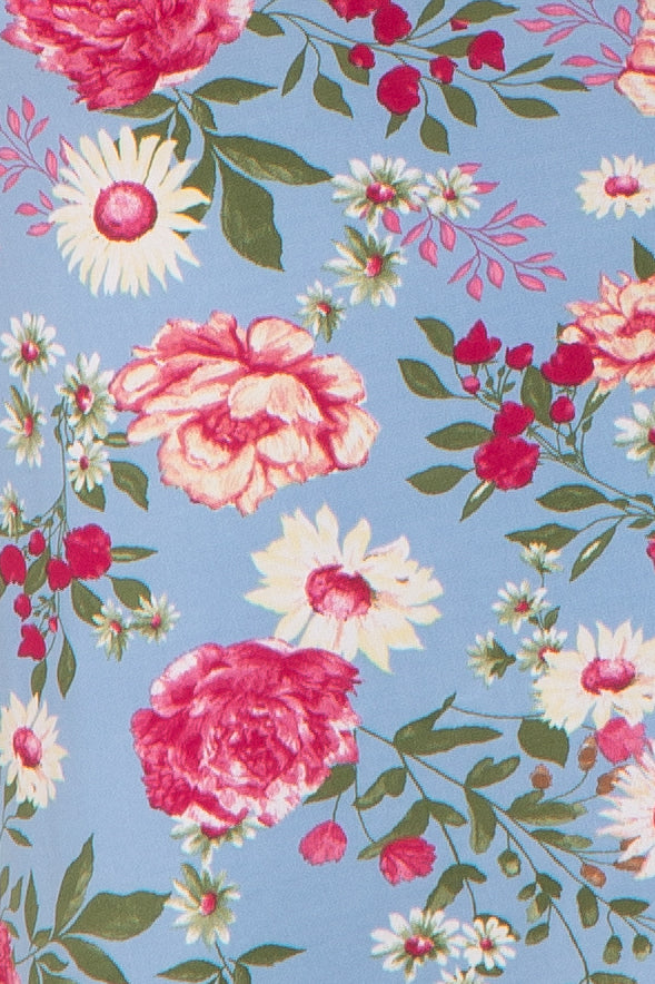 Floral pattern with pink roses and white daisies on a light blue background