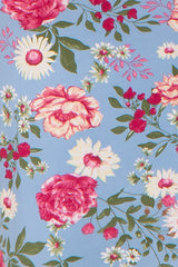 Floral pattern with pink roses and white daisies on a light blue background
