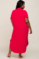 Back view of a woman wearing a plus size hot pink short sleeve midi shirt dress with side slits