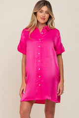 woman wearing a hot pink short sleeve button down satin shirt dress