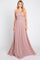 woman wearing a blush strapless long gown with ruching details and flowing skirt